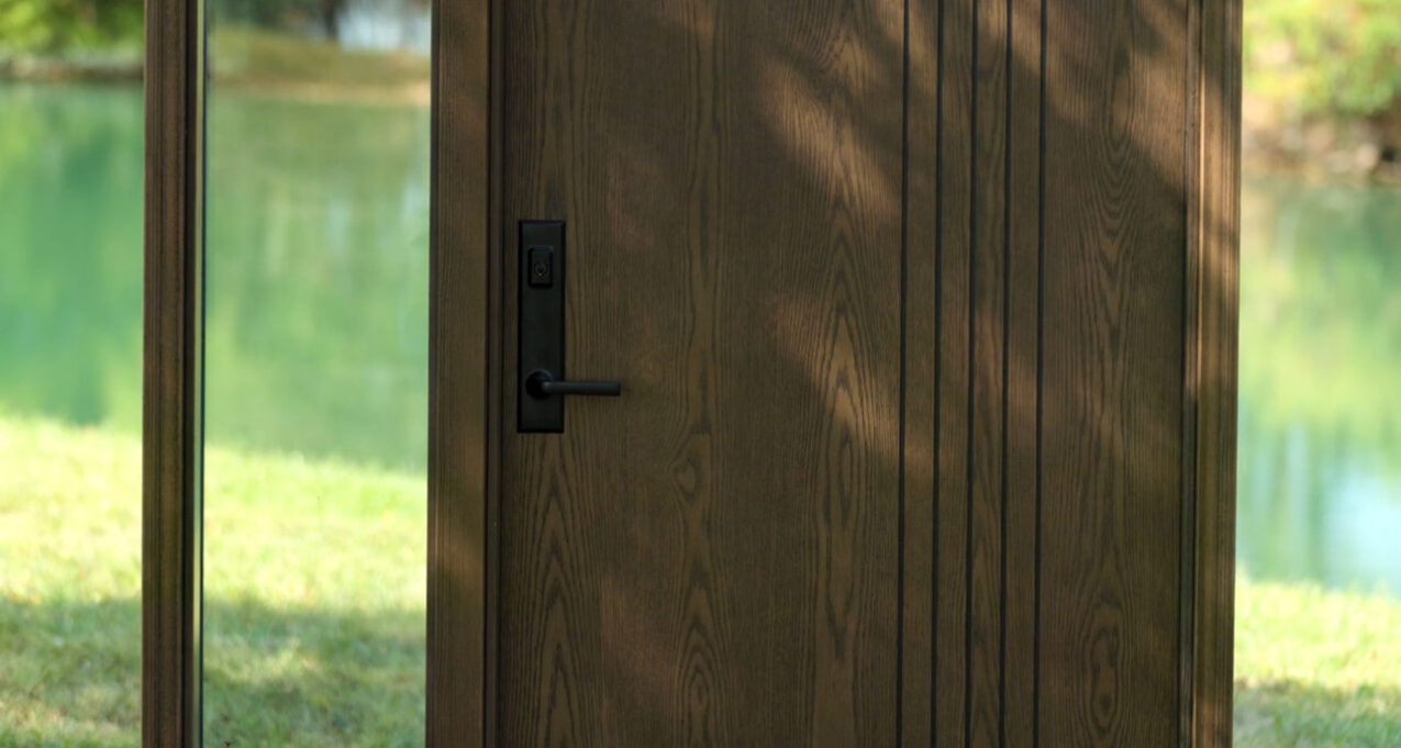 ProVia® Ascent™ fiberglass entry door video thumbnail showing and Ascent door and clear glass sidelites.