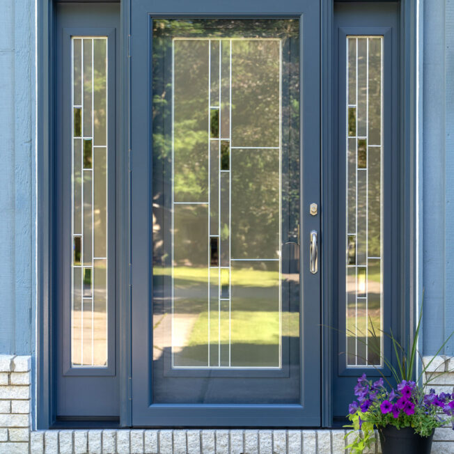 ProVia® Deluxe™ 397 Full View Storm Door in Enzian Blue coordinating with a ProVia® entry door