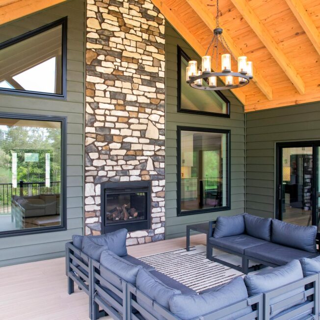 ProVia® Endure™ Picture Windows, Shaped Windows, and 2-Lite sliding patio door in Textured Matte Coal Black