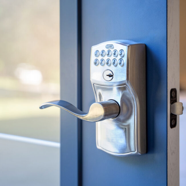 Closeup view of a Schlage® Accent Lever Electronic Lockset in Satin Nickel on a ProVia entry door