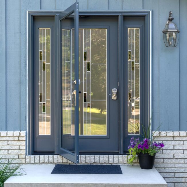 ProVia® Signet® Smooth 460 entry door and sidelites in Enzian Blue with Genesis Decorative Glass