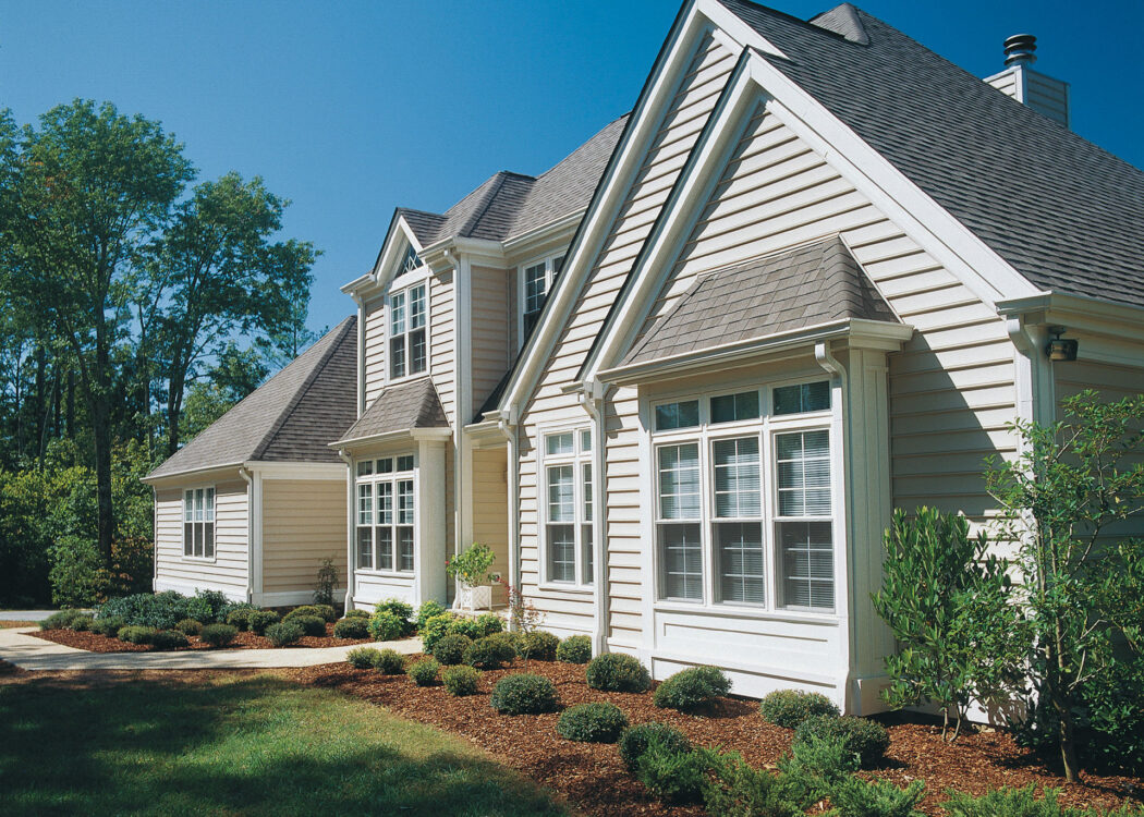 Exterior image of ProVia® Traditional Beaded vinyl siding in the color Linen