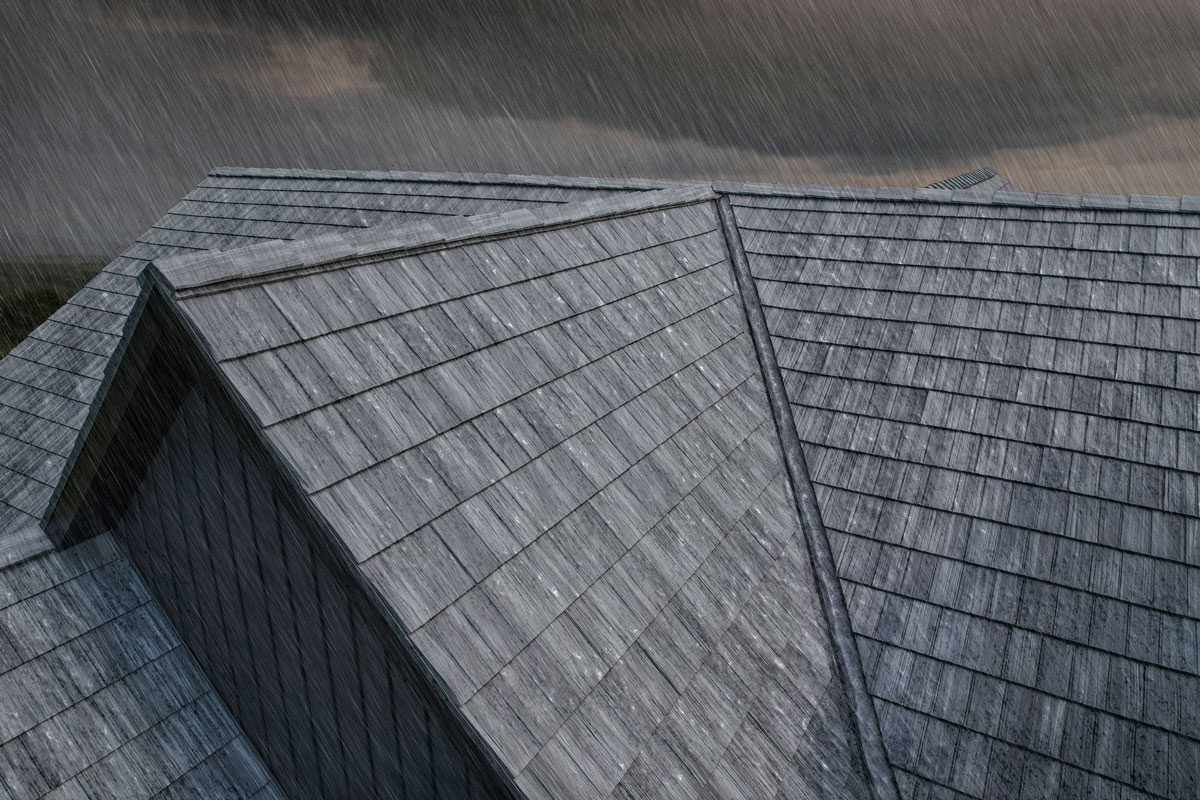 Closeup image of a stormy sky and ProVia Shadewood Shake metal house roofing system