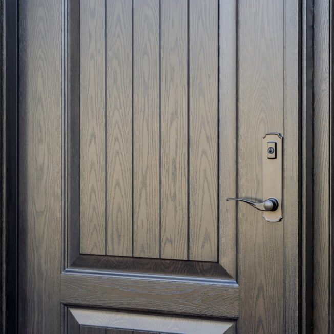 Closeup exterior view of a ProVia® Ascent™ White Oak 002CP-449 Entry Door and Sidelites in Espresso with Symphony Decorative Glass