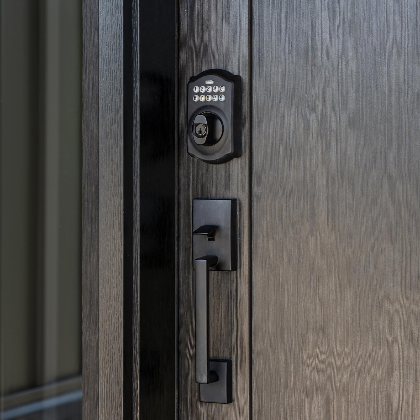 Schlage® Century Handle and Electronic Keypad Deadbolt in Black