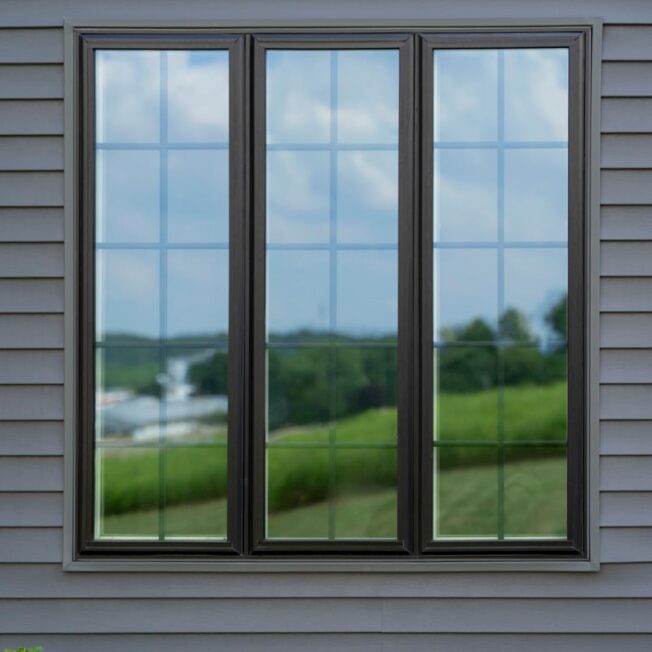 Exterior view of a ProVia® Endure™ 3-Lite Casement Window in Coal Black with Internal Grids