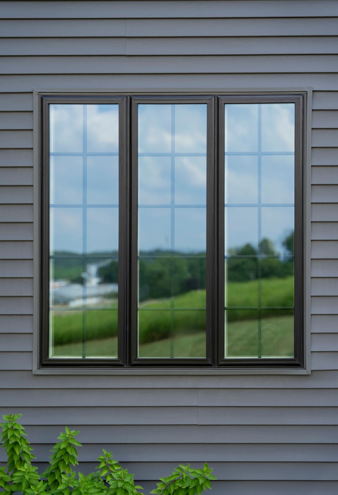 Endure™ 3-Lite Casement Window in Coal Black with Internal Grids