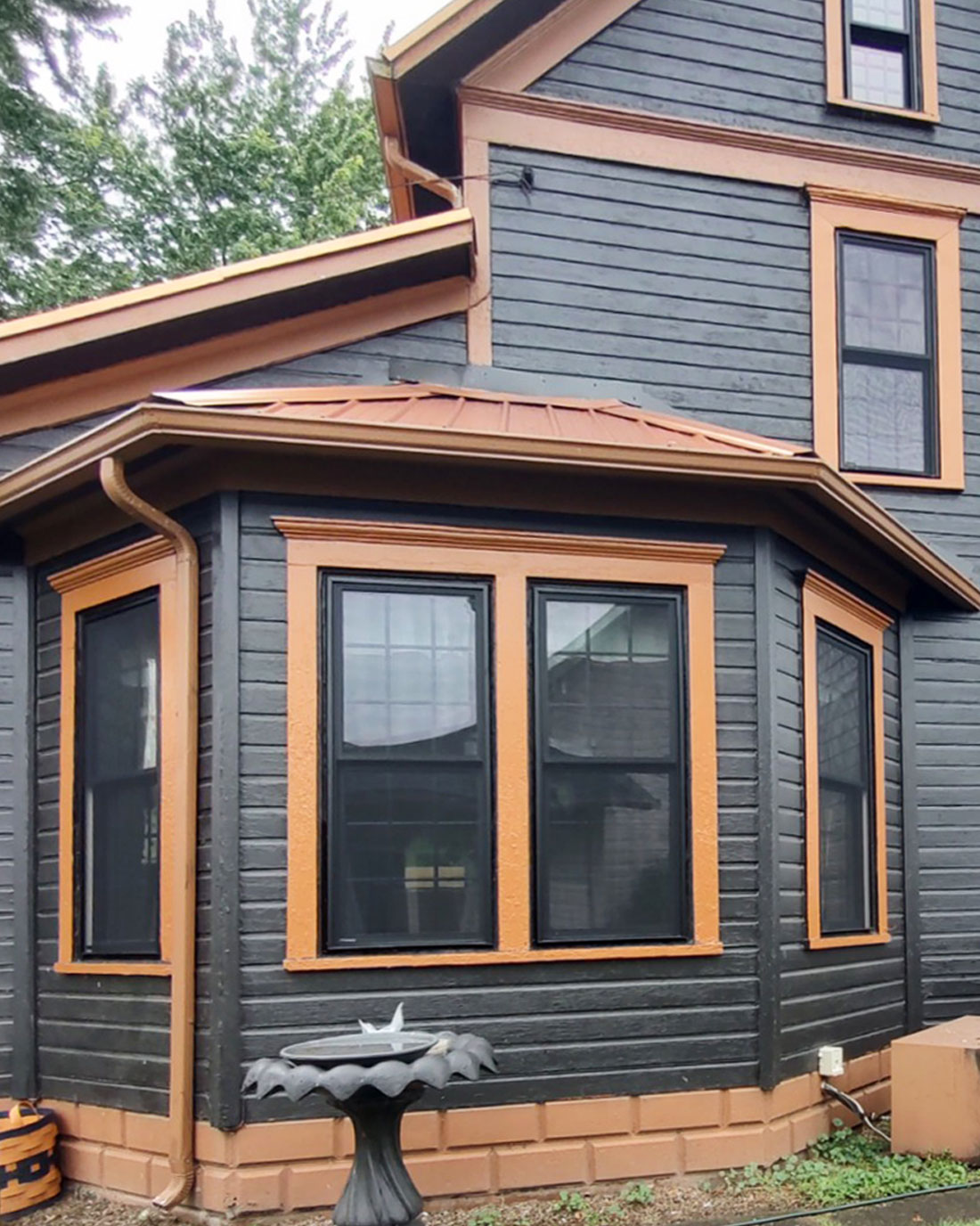 Jack C. Endure™ Double Hung Windows in Coal Black with Colonial Grids After