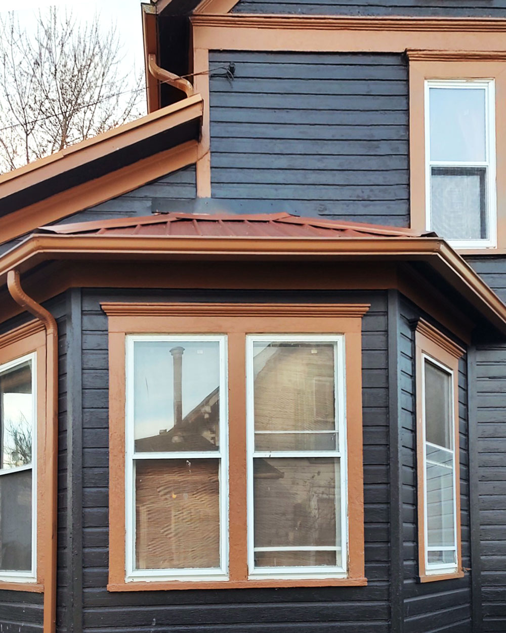 Jack C. Endure™ Double Hung Windows in Coal Black with Colonial Grids Before