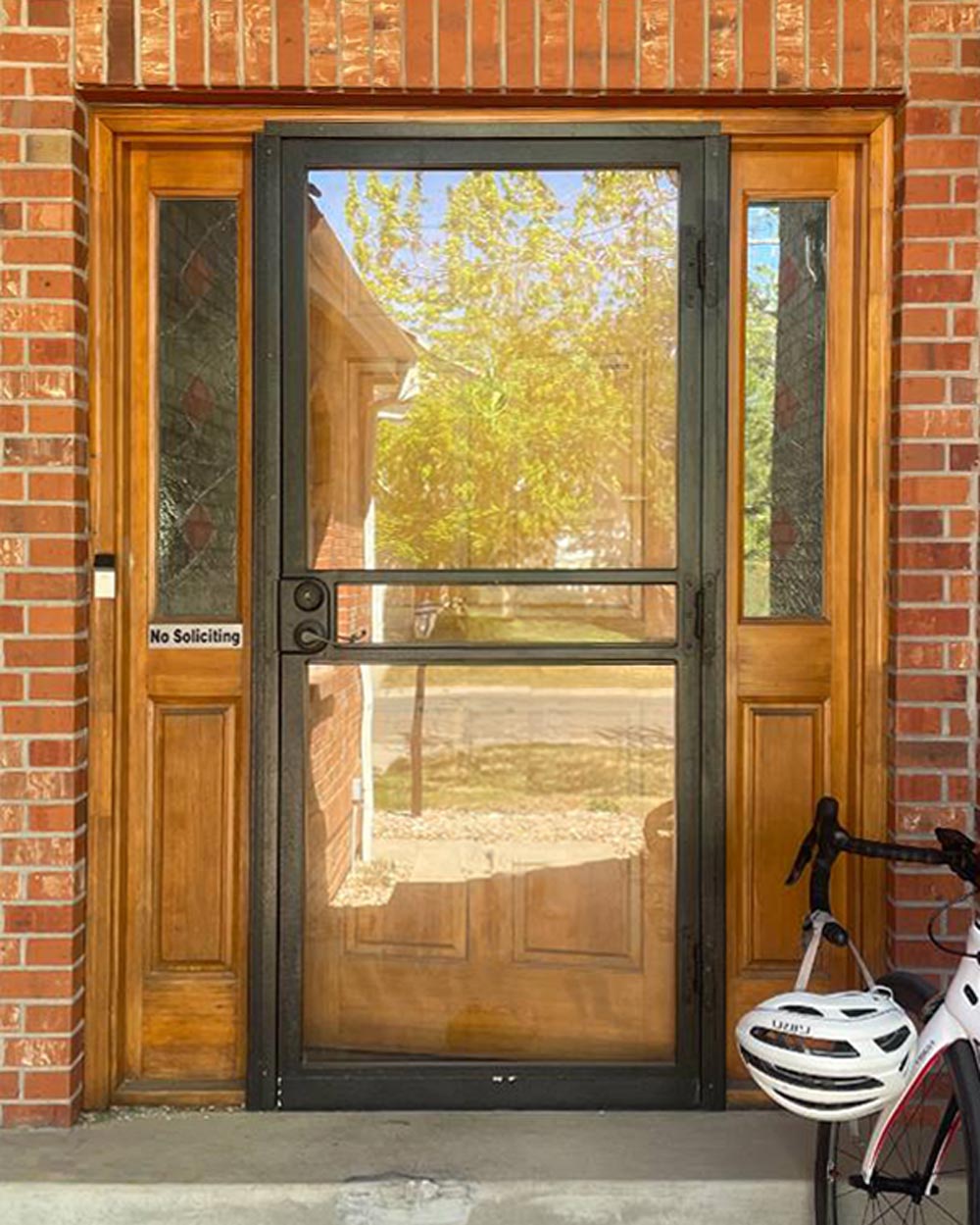 Jay E. Entry Door and Sidelites with Decorative Glass Before