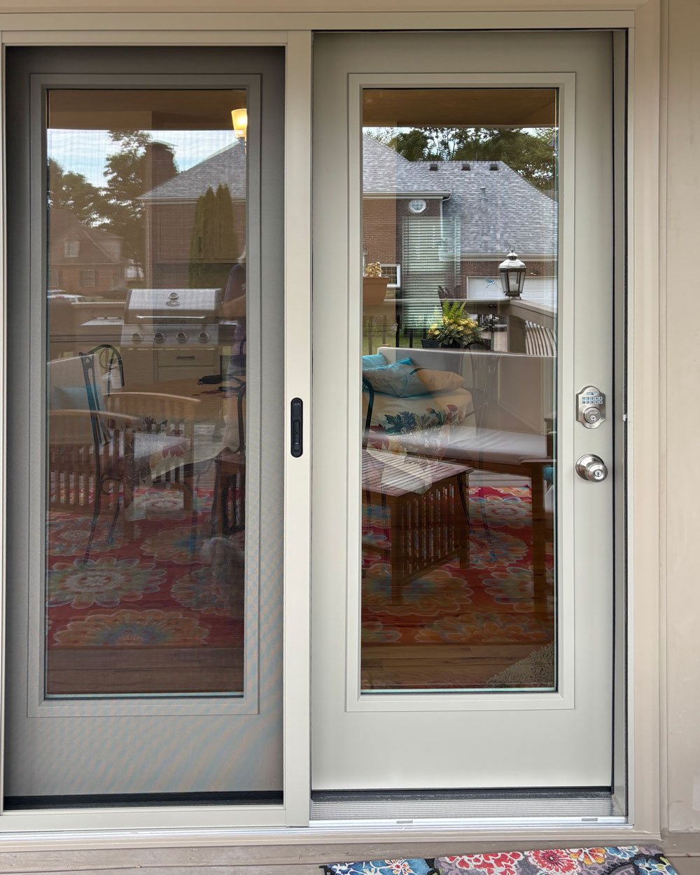 Outside view of a ProVia® Legacy™ Smooth 460 Hinged Patio Door in Sandstone