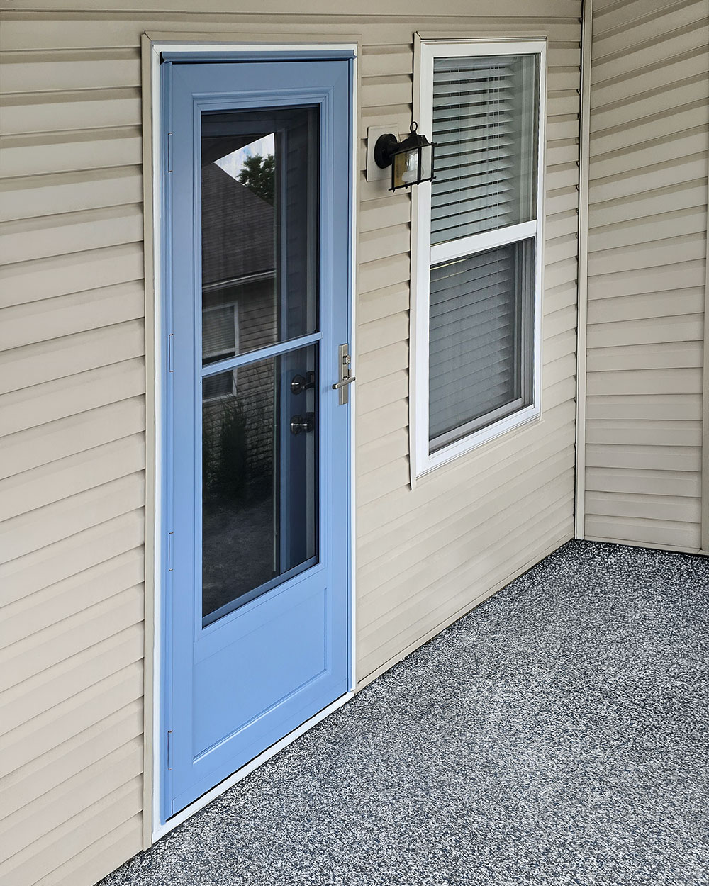 Walter D. Deluxe™ 399 Storm Door and Legacy™ 460 Entry Door in Rainfall After