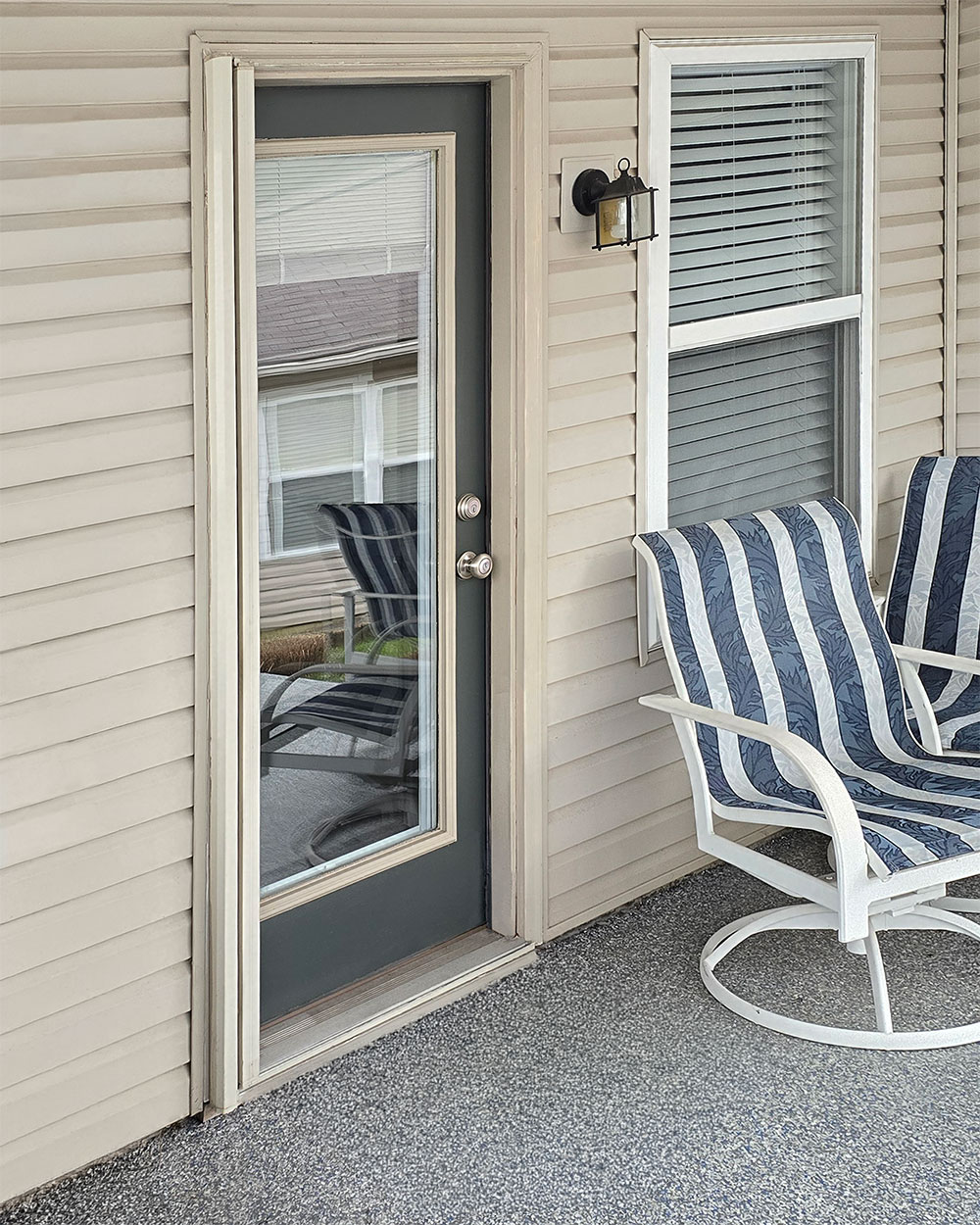Walter D. Deluxe™ 399 Storm Door and Legacy™ 460 Entry Door in Rainfall Before